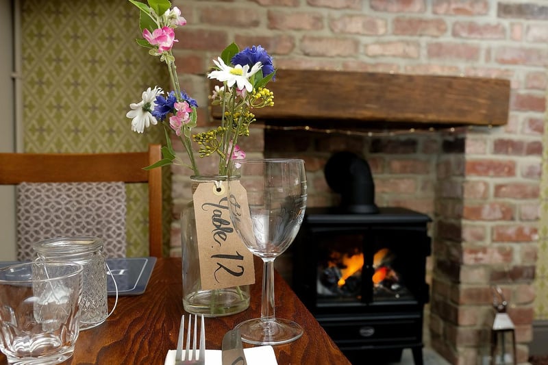 With restrictions now eased you can book a table for a meal by the fire...