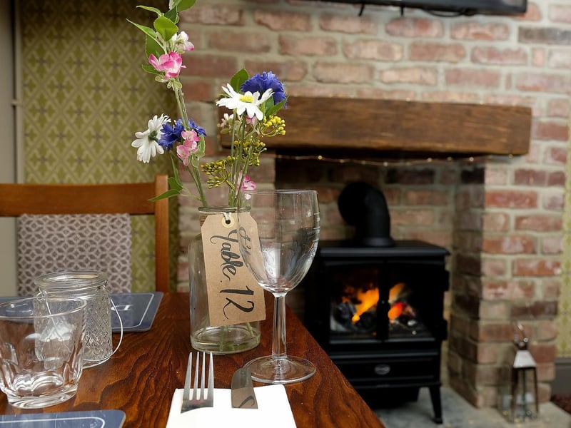 With restrictions now eased you can book a table for a meal by the fire...
