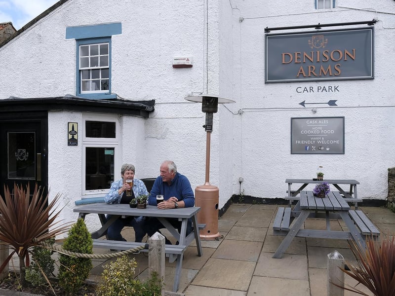 Enjoying a pint outside at The Denison Arms.