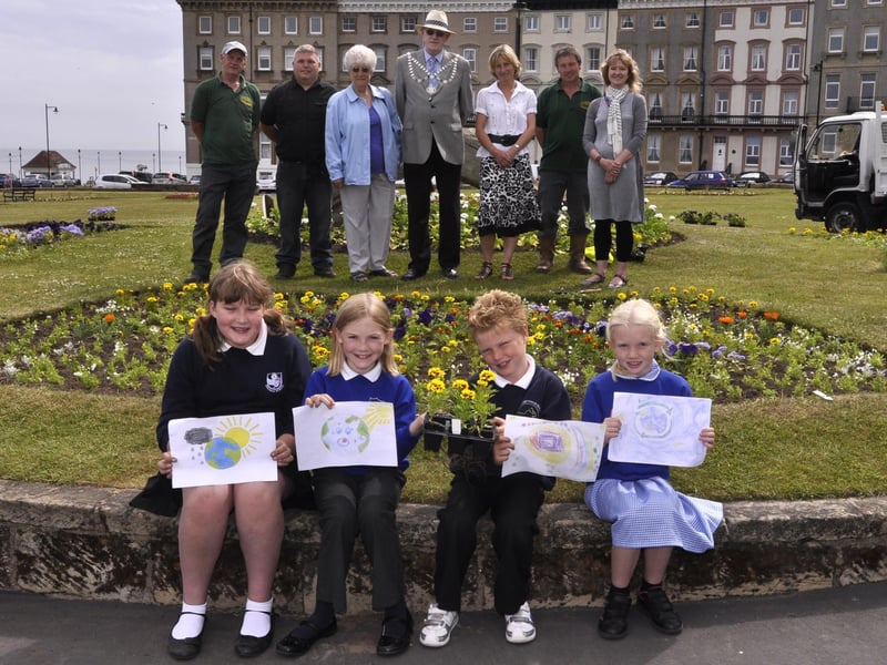 Young winners of the In Bloom flower bed competition.
Students from Whitby Community College visit a roadshow for Engineering Week.
Children of Ruswarp School are excited to be in the crowd to see the Queen at Scarborough.