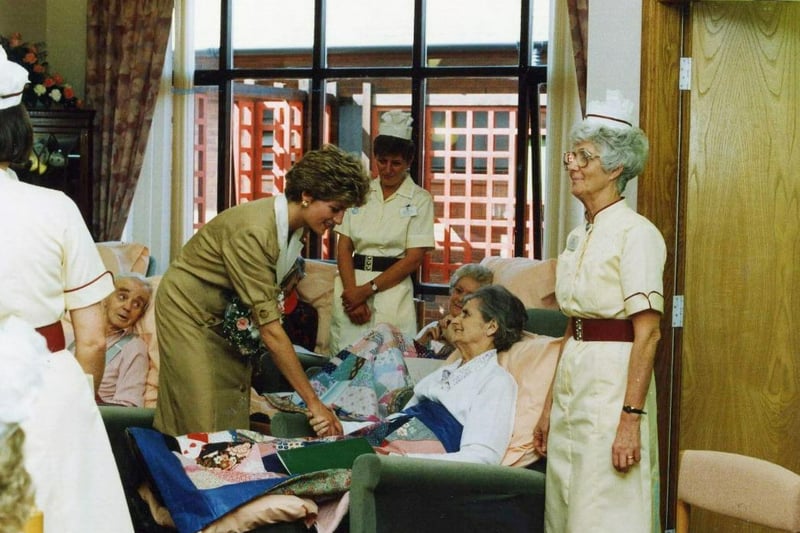 Princess Diana with some patients at Trinity Hospice