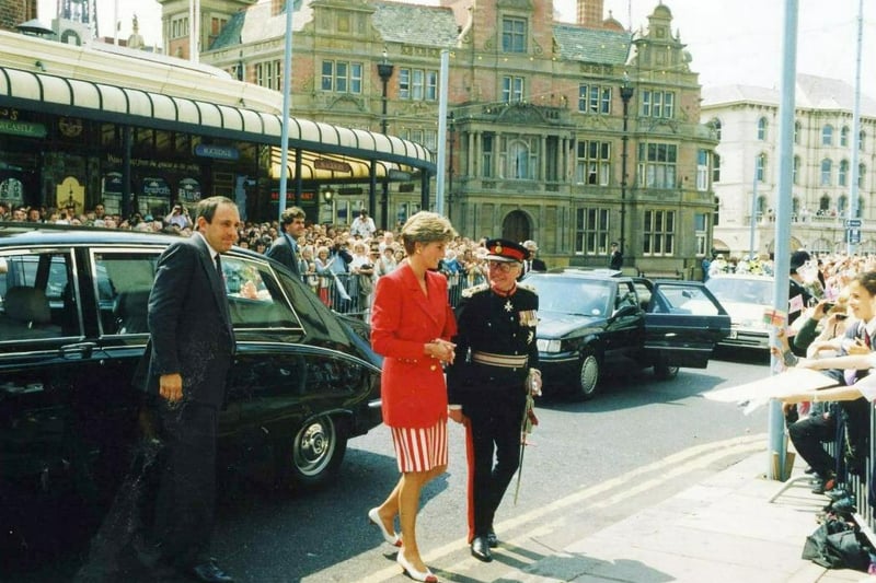 Princess Diana arrives at CJ's Cafe on Talbot Road Blackpool accompanied by the Lord Lieutenant of Lancashire, Sir Simon Towneley in 1991