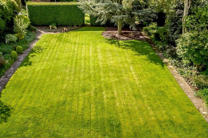 The beautiful landscaped rear garden is completely private and enclosed with extensive south facing sun terrace, ideal for outside entertaining and there is an additional enclosed and secluded garden area with summerhouse and greenhouse and in all the grounds extend to almost 11⁄4 acres.