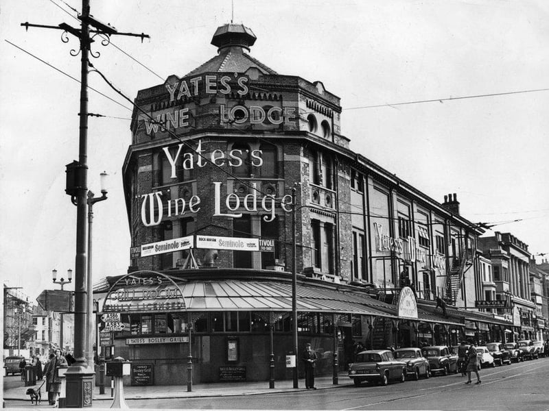 Yates's Wine Lodge, which originally opened as the Arcade and Assembly Rooms in 1868, is pictured here in 1977
