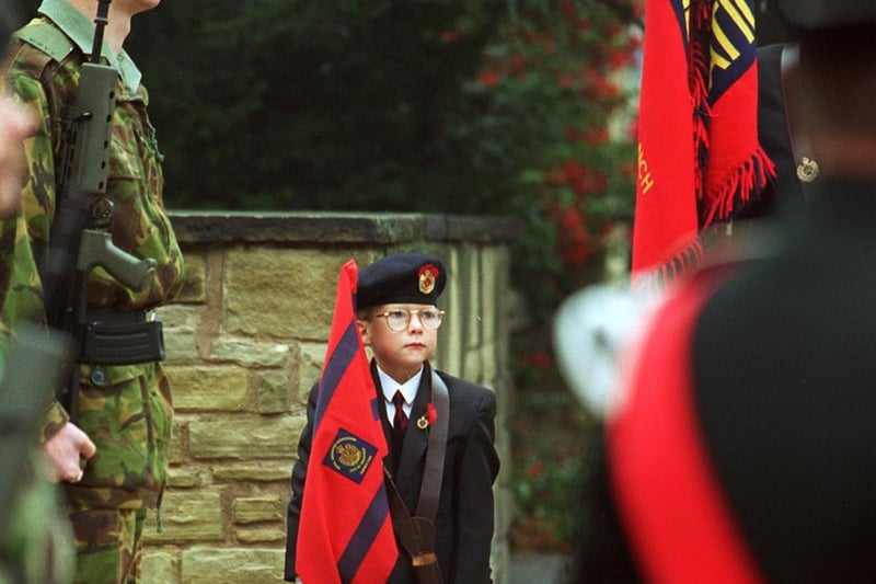Young Lyndon Andrew Duke, the Royal Engineers mascot, stands to attention during the rememberance service at Wakefield in November 1996.