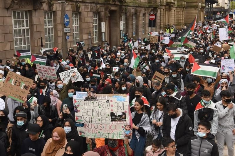 Crowds of people united under a sign reading 'Preston for Palestine' and waved Palestinian flags as they took to the streets in solidarity today.