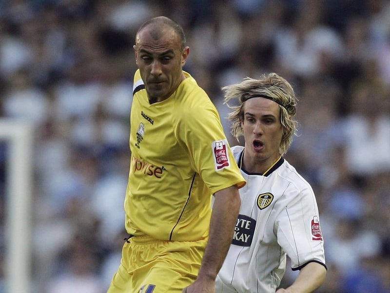 Preston  North End's Danny Dichio shields the ball from Matthew Kilgallon.
