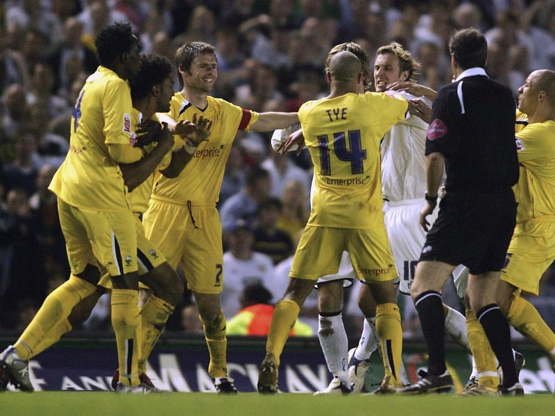 Preston players react as striker Rob Hulse is kept at arms length from Claude Davis (extreme left).