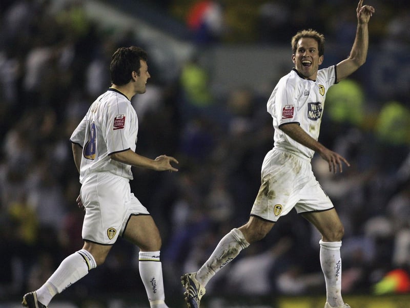 Eddie Lewis celebrates his equalising goal with striker Robbie Blake.