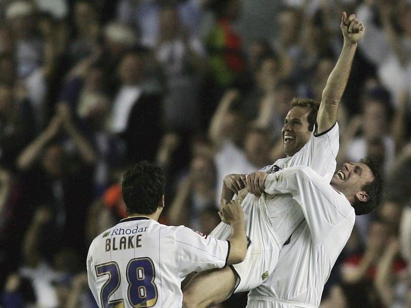Eddie Lewis celebrates his equaliser with Sean Gregan and Robbie Blake.