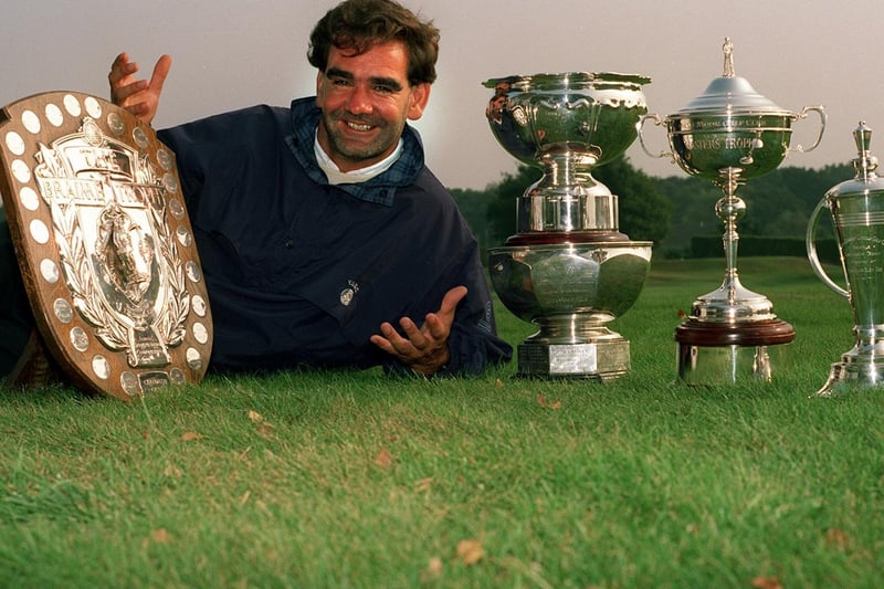 This is Garforth Golf Club member Andy King in September 1998 with the trophies he won over the last year.