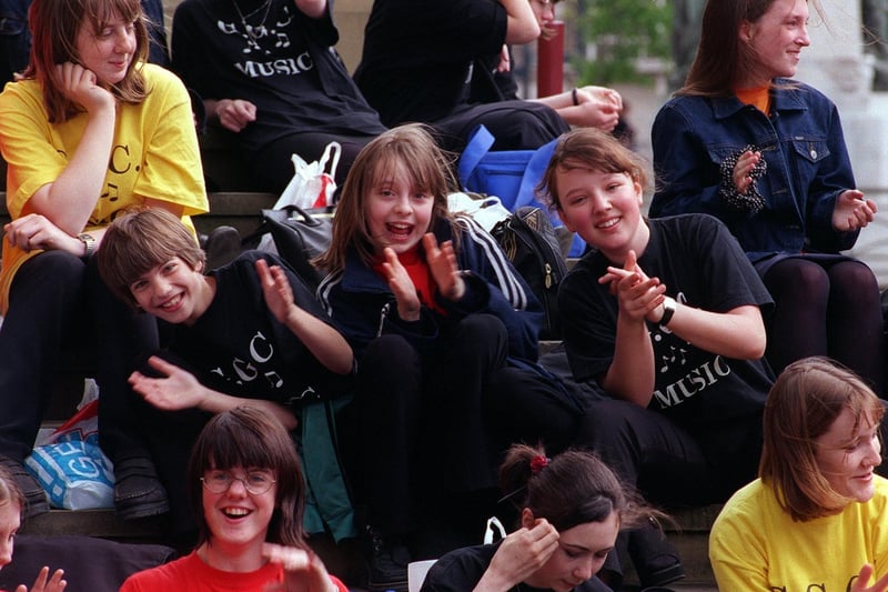 Members of Garforth Community College gospel choir swing along to steel band music at the Breeze Festival in June 1998. Pictured are Lisa Brain, Anna Whiteley and Katie Dobbs.