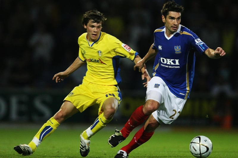 Jonny Howson hunts down Pompey's  Richard Hughes during the Carling Cup second round clash at Fratton Park in August 2007.