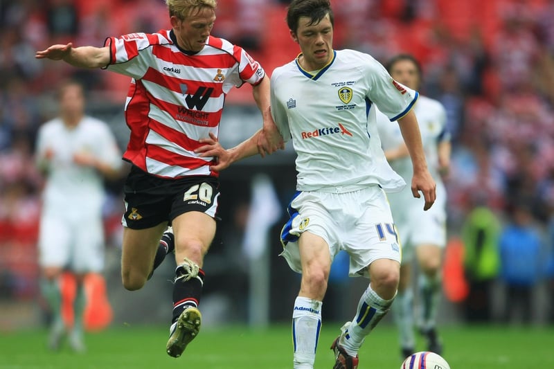 Jonny Howson tangles with Paul Green during the League One play off final against Doncaster Rovers at Wembley in May 2008.
