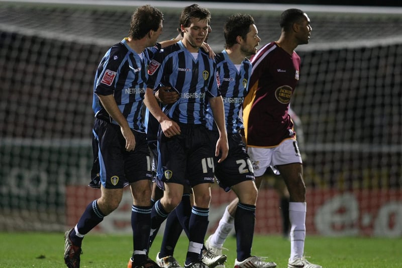 Jonny Howson is congratulated after his deflected shot found the back of the net during the FA Cup first round replay against Northampton Town at Sixfields Stadium in November 2008.
