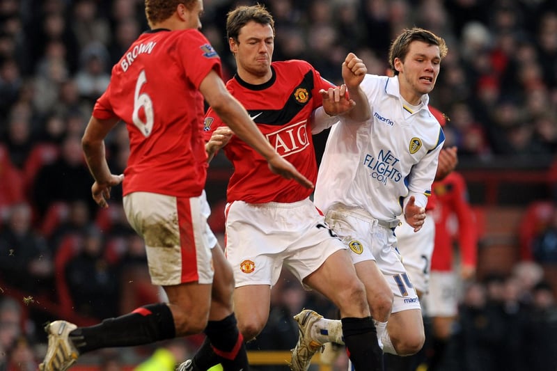 Jonny Howson vies with Manchester United's Jonny Evans during the FA Cup third round clash at Old Trafford in January 2010.
