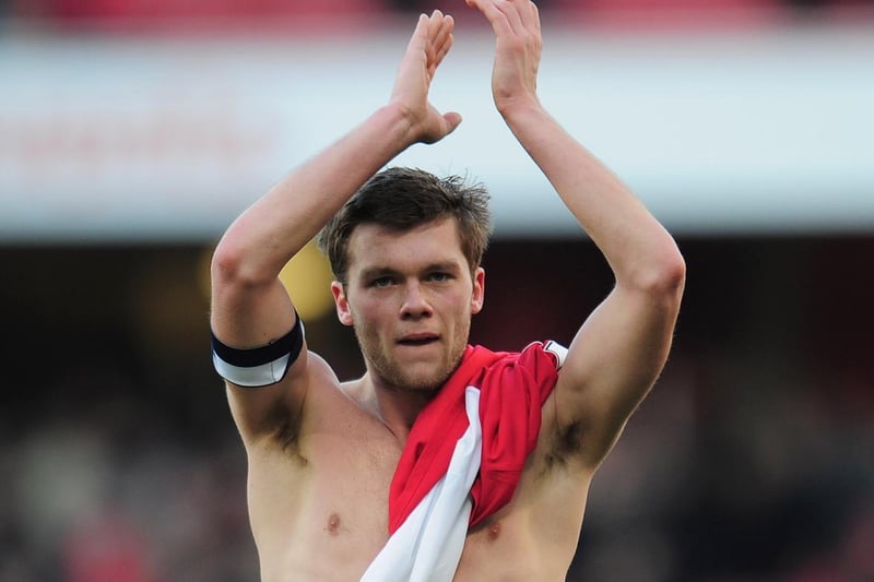 Jonny Howson acknowledges the travelling support after the FA Cup third round clash against Arsenal at the Emirates Stadium in January 2011.