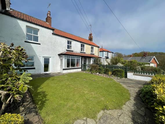 The traditional style cottage has charm and character