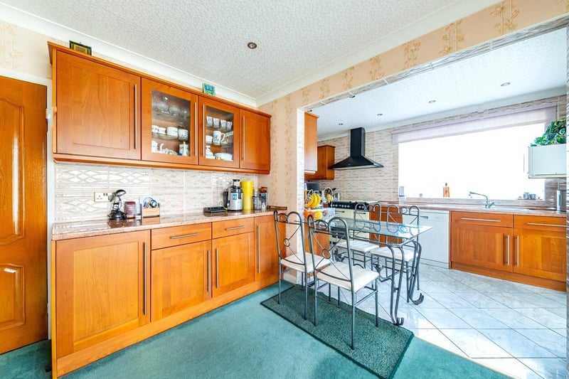 The smart and well-lit kitchen within the property