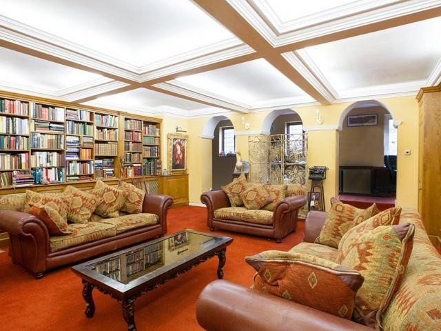 The vast house keeps on giving on it ground floor with the handy addition of a private study and an impressive oak panelled and shelved library with generous seating area, concealed cupboards, feature ornate wooden fire surround and stone hearth for open fire.