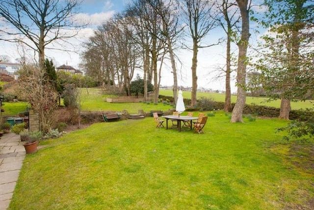 Outside, the grounds are a highlight of this home. There are extensive lawned areas, orchard, trees and shrubs and although the grounds are large they have been developed for ease of maintenance.