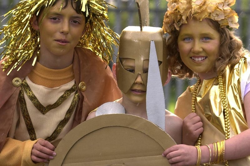 Pictured, left to right, are Matthew Powell, Benjamin Martin and Laura Cresswell on the Pudsey Lowtown Primary School 'King Midas' float in May 2002.