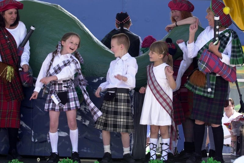 Youngsters enjoying a dance routine on the Pudsey Waterloo Infant School float in May 2004.