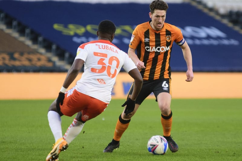 Smallwood, 30, captained the Tigers to the title and has a season left on his contract.He is pictured on the ball against Blackpool at the KCOM Stadium