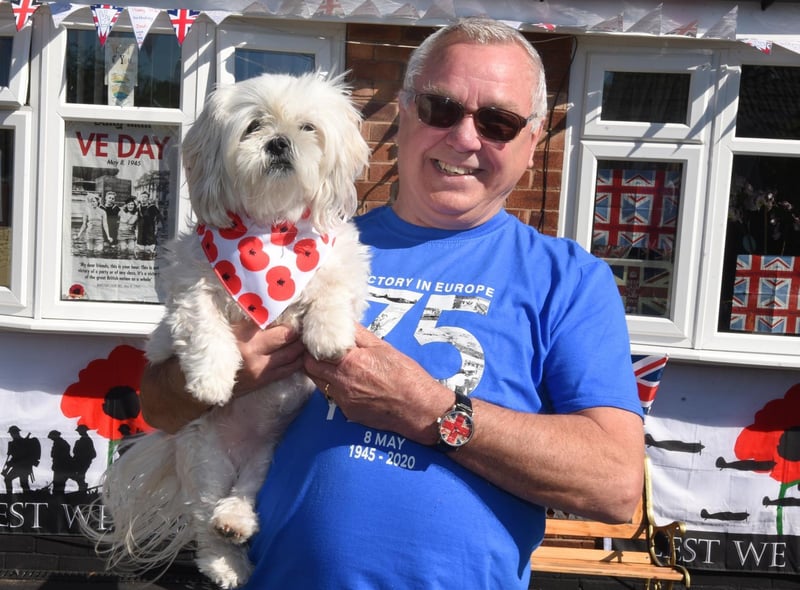 Last year Victor Johnson, from Abram, pictured with dog Poppy, decorated his home with flags as a double celebration, he was born on VE Day and marked his 75th birthday.