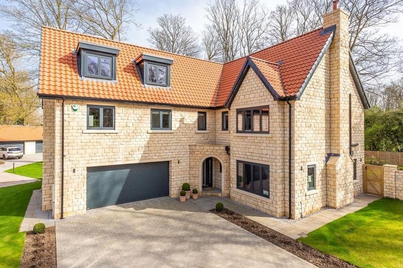 This six bedroom detached home in Burghwallis near Doncaster is is newly built and boasts a a gated entrance, a modern open plan living space and four additional bathrooms. Set over three floors, the home incorporates smart tech including app controlled heating, lighting and security systems. It is on the market with Fine & Country for 755,000.