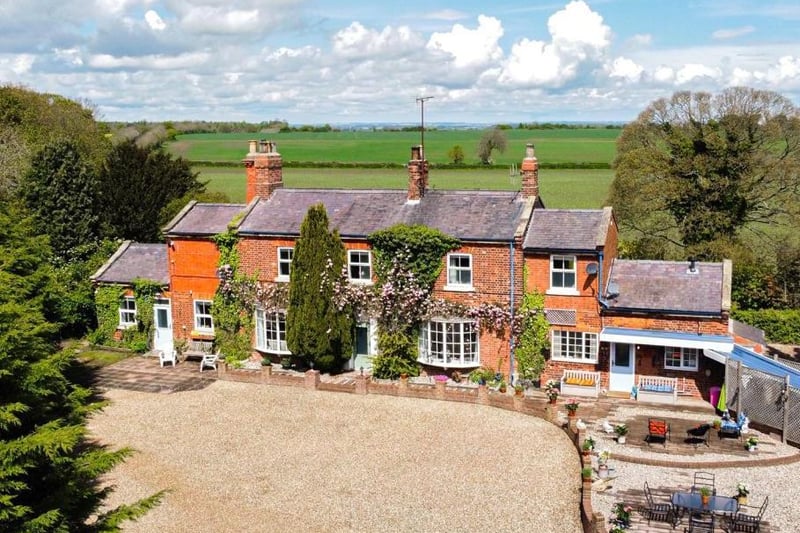 This absolutely stunning period property comes in at just over the average asking price in London at 800,000. The Malton Road home was originally the old railway station, sitting just outside the village of Cherry Burton. It offers four bedrooms, a self-contained annex and approximately one acre of land. It is on the market with Fine & Country.