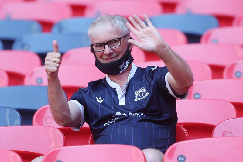 A Morecambe fan is in good spirits ahead of the final.