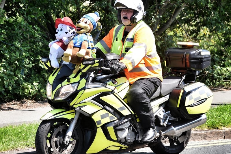 A motorcycle rider with Paw Patrol characters on the front for George Hinds Paw Patrol convoy. Picture by Julian Brown 30/05/21