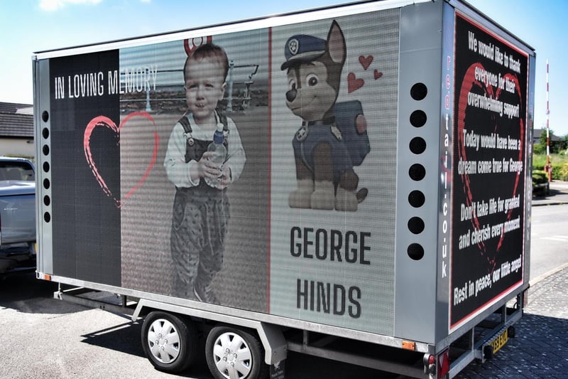 A trailer lit up for George Hinds who died in an explosion at Heysham. George's Prom Convoy set off from Morecambe FC earlier today. Picture by Julian Brown 30/05/21