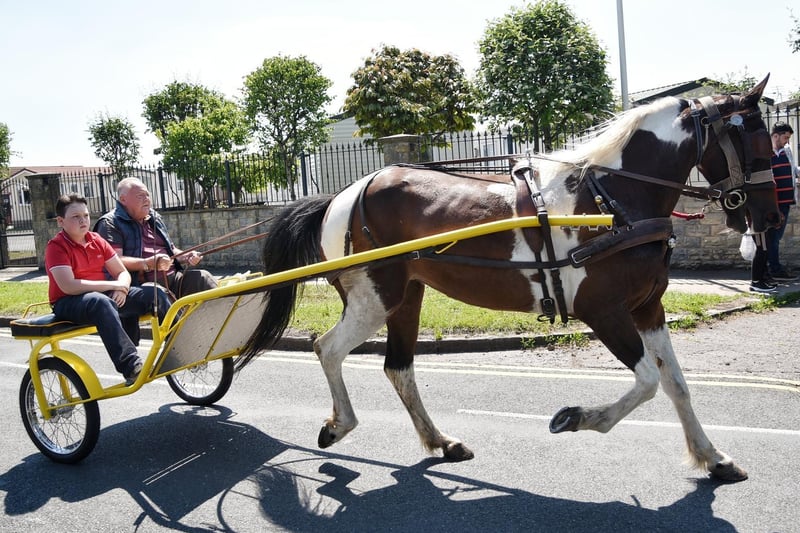 Horses and traps were just some of those taking part in George's Prom Convoy for George Hinds, the little boy who died in the Heysham gas explosion sets off from Morecambe FC. Picture by Julian Brown 30/05/21