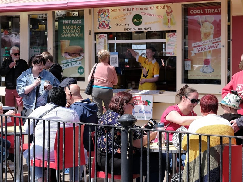 Customers enjoy ice creams at the Harbour Bar.