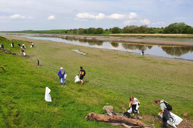The volunteers set out on one of the hottest days of the year to clean up the Ribble's banks.