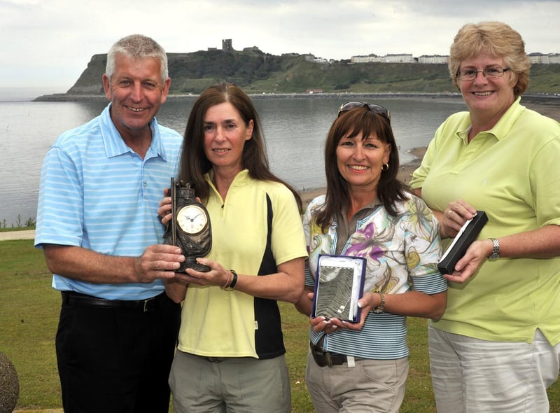Simon Deller presents awards to North Cliff lady golfers Janet Brown, Debbie Haith and Alison Lockwood.