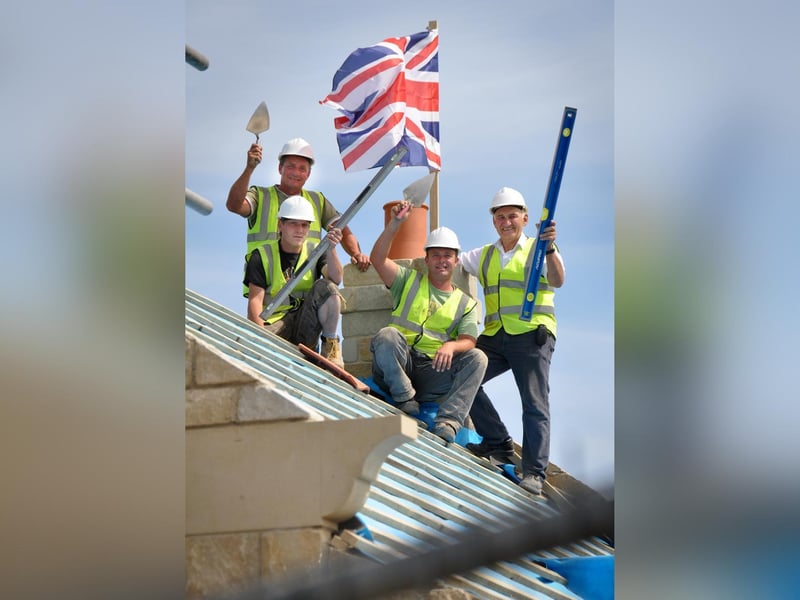 The tradition of ‘topping out’ was practised in Burniston by Graham Bloor, right, and his team.