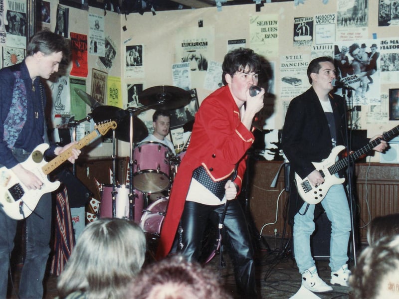 This local band demonstrate some of the alternative fashions of the day, many of which are back in style today.