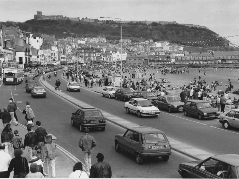 The cars may be different but the buildings look familiar, as does the sight of tourists on Foreshore Road.