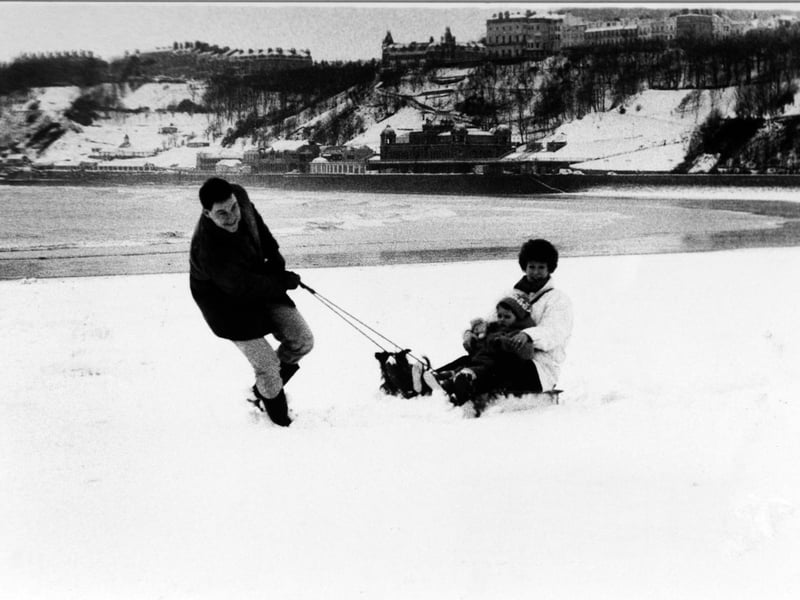 One thing that never changes is the unpredictable weather on the Yorkshire Coast - exemplified here by snow on South Bay enjoyed by David and Joy Wilcox, 3-year-old Elizabeth and their dog, Mitzy.