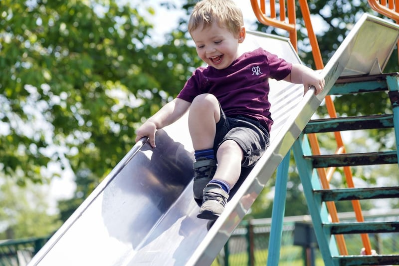 George Richards having fun on the slide at Pontefract Park