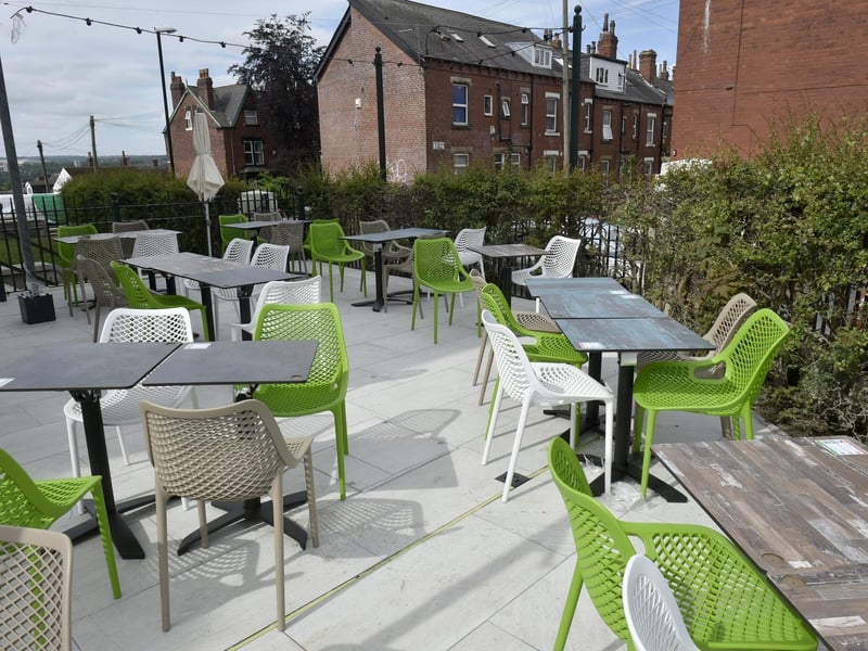 Outdoor seating to the rear of the pub.