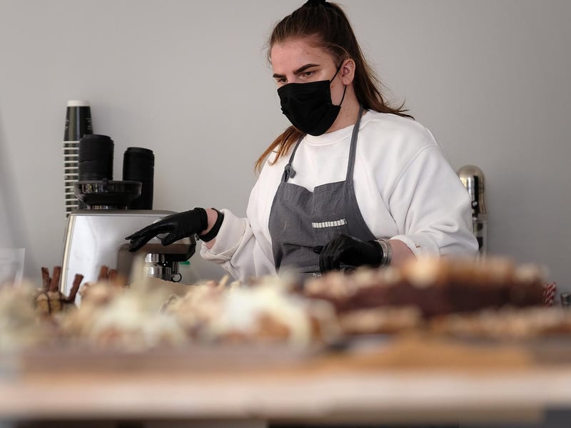 Emily Boycott at the counter.