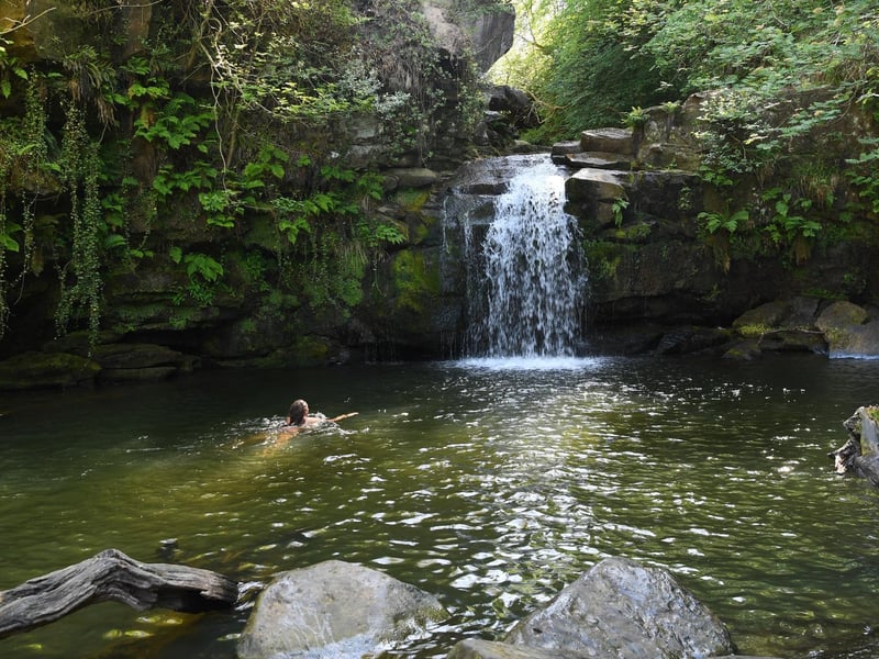 In the middle of beautiful woodland, this wild swimming spot in the heart of the moors near Beck Hole, sits under a waterfall. Steam trains pass nearby making this one of the more unusual places to take a dip.