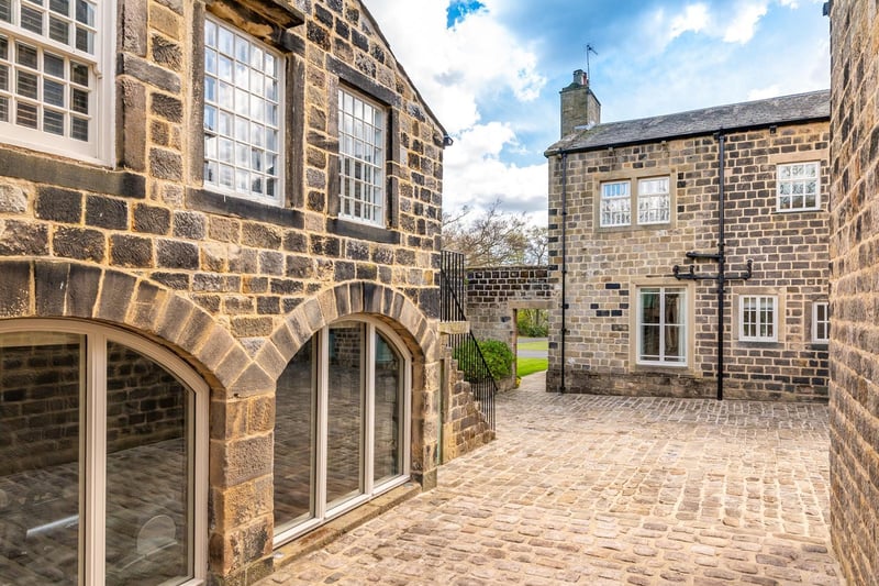 The property centres around a beautiful cobbled courtyard and is surrounded by seven acres of land.