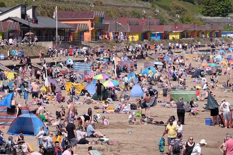 With foreign trips curtailed, families flocked to the local beaches instead