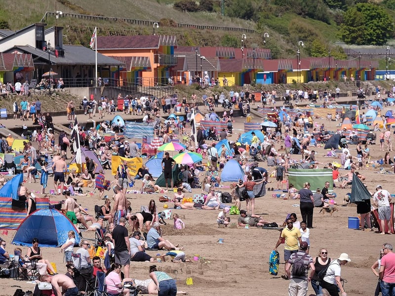 With foreign trips curtailed, families flocked to the local beaches instead