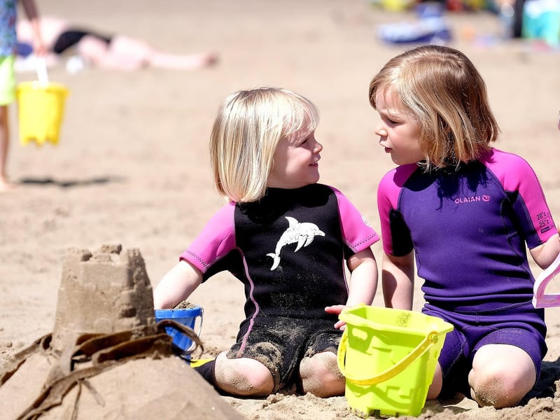 Little Sophie and Imogen admire their creations